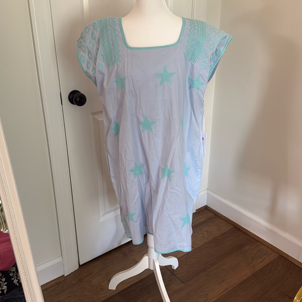 Lined dress with pockets and embroidered